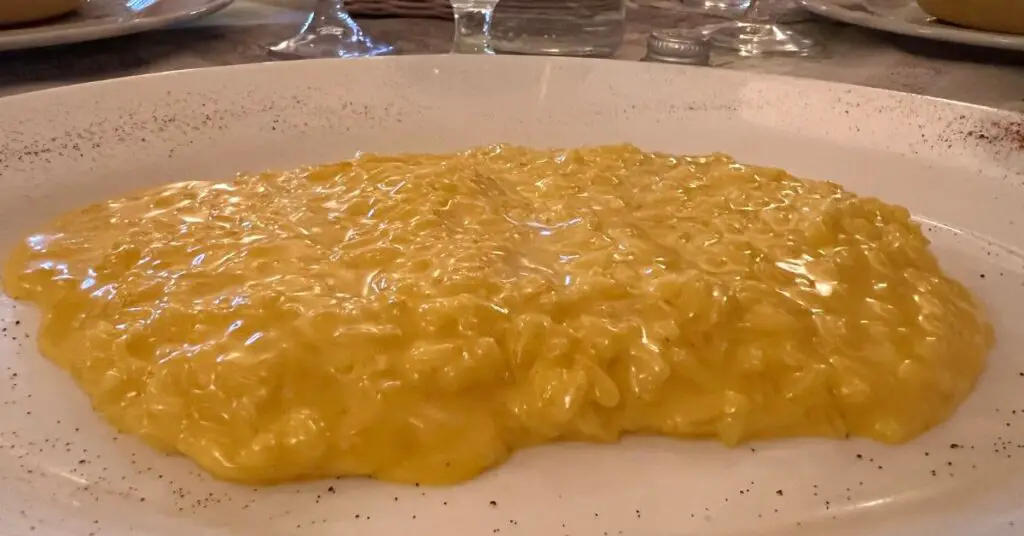A classic Italian first course, Milanese saffron risotto, resembles a grainy golden mush.