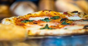 How big and heavy is a traditional Italian Pizza?
