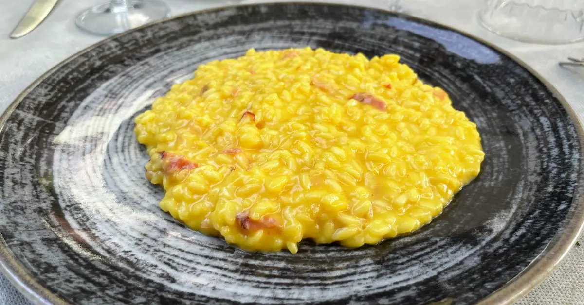 Saffron risotto is always plated on a flat plate.
