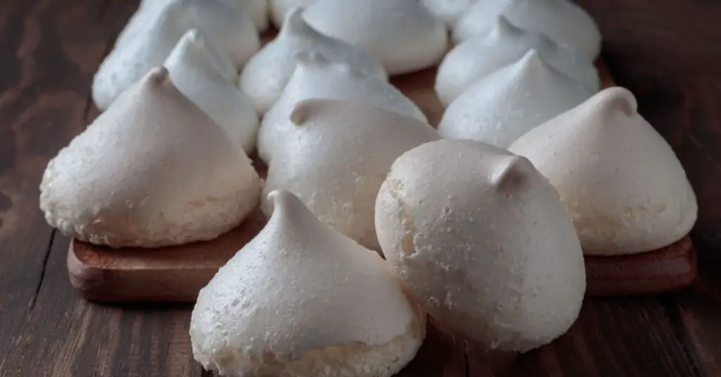 Big white dome-shaped meringues.