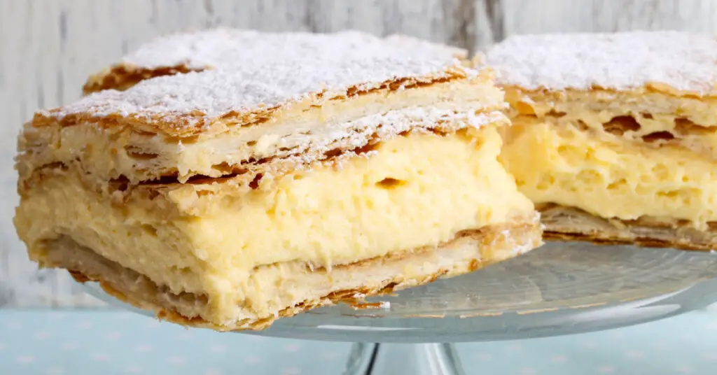 This Tuscan dessert called "scendiletto" is made from two layers of corccante puff pastry that contain a nice layer of yellow cream.