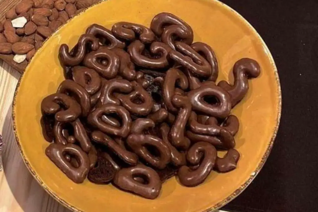 Some chocolate biscuits made in the shape of letters of the alphabet, each biscuit is a letter, are called Quaresimali and are part of the Easter tradition in Tuscany.