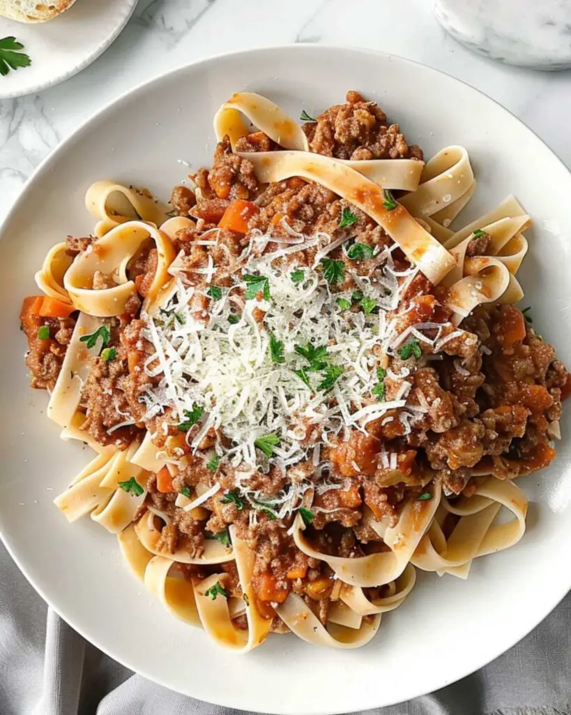 A delicious serving of gluten free Ragu alla Bolognese on a plate, capturing the essence of gluten free Italian meals.