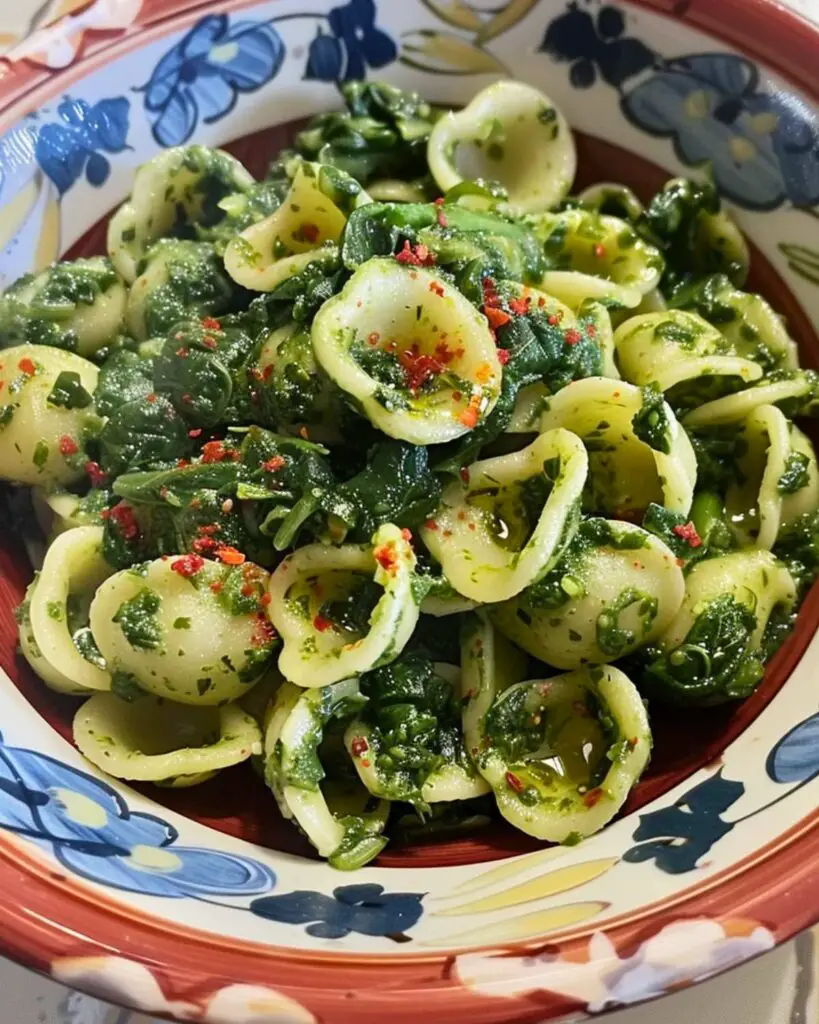 Authentic Italian pasta recipe featuring Orecchiette with broccoli rabe, a classic dish from Puglia