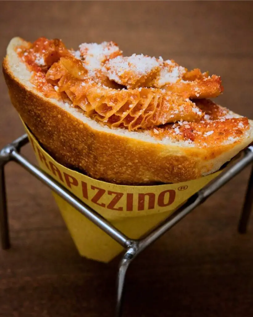 A selection of Trapizzino filled with various ingredients, showcasing some of the best street food in Rome.