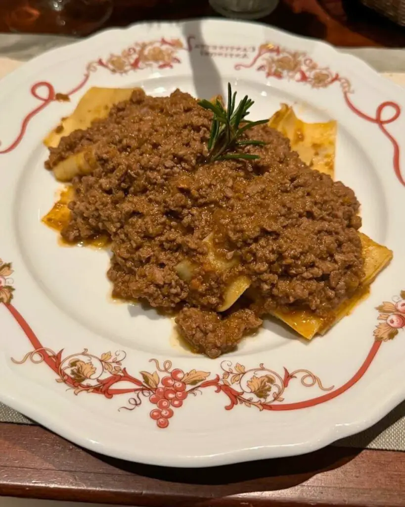 A plate of freshly prepared pasta topped with meet ragu at Cantinetta Antinori, highlighting one of the best food experiences in Florence.