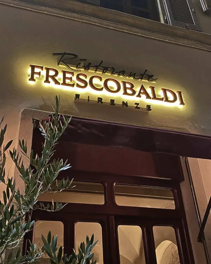 Neon sign of Ristorante Frescobaldi, a top restaurant in Florence showcasing its classy entrance.