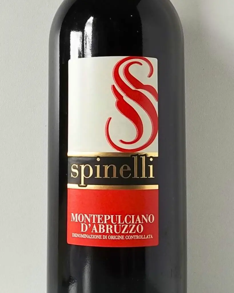 Bottle of Montepulciano d’Abruzzo Spinelli, featuring an elegant Italian wine label, representing one of the best Italian wines with rich fruity and spicy notes.