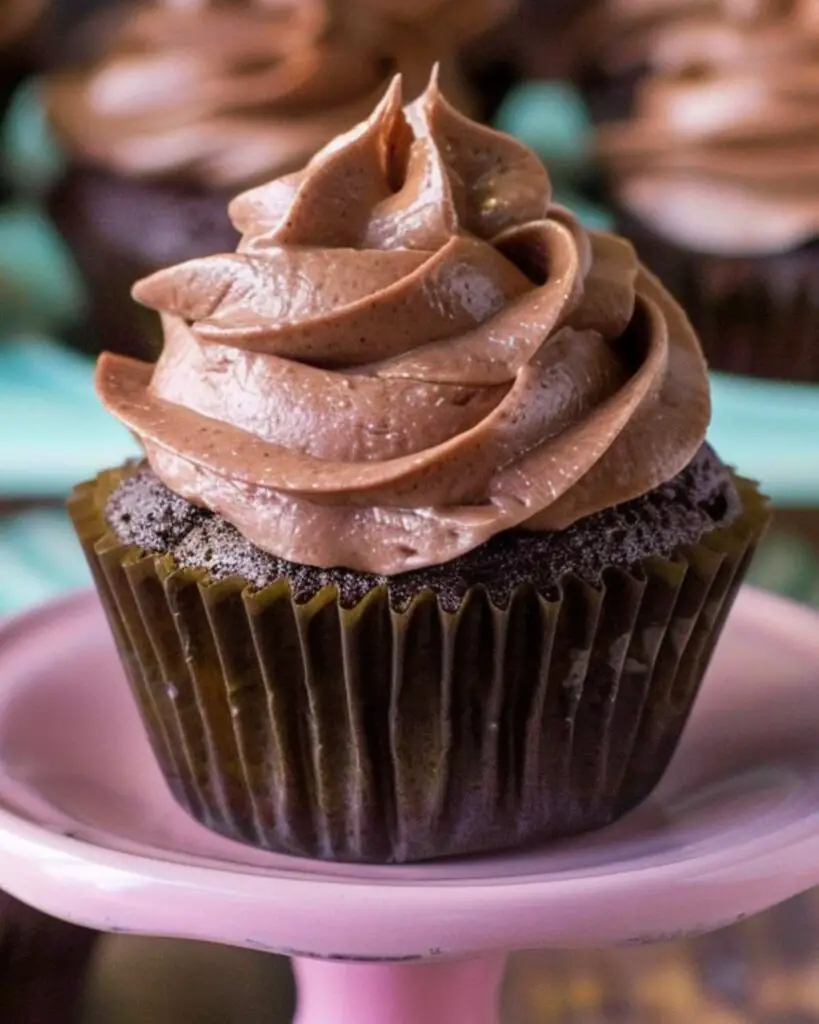 Nutella chocolate cupcakes topped with creamy Nutella mascarpone frosting, showcasing Italian flavored cupcakes and Italian party cupcakes.