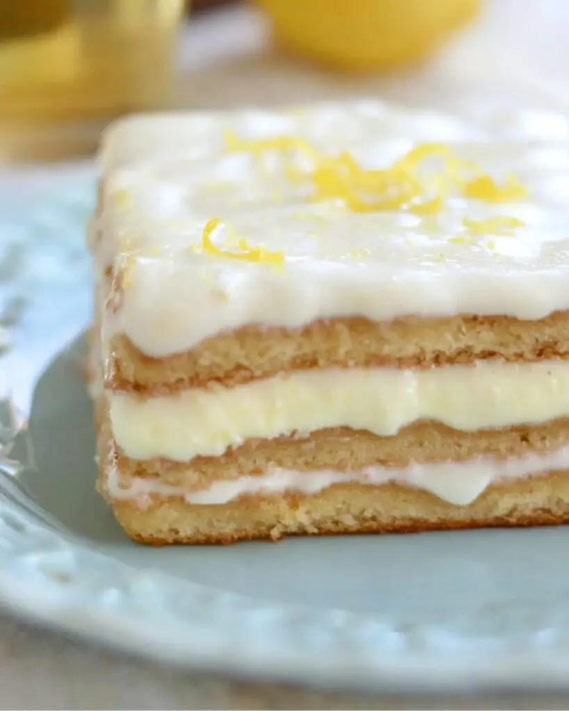 A Limoncello Tiramisu showcasing layers of ladyfingers soaked in limoncello, perfect for an Italian-themed Thanksgiving celebration.