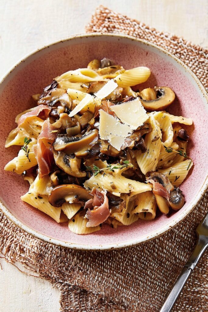 Thanksgiving pasta dish with caramelized mushrooms and crispy prosciutto.