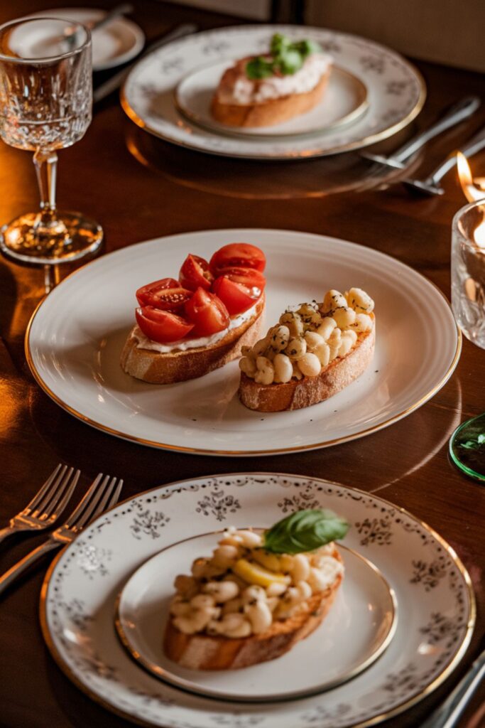 Three bruschetta toppings on toasted bread with bowls of chopped tomatoes, mashed cannellini beans, and celery puree, perfect for an Italian Christmas dinner for two.