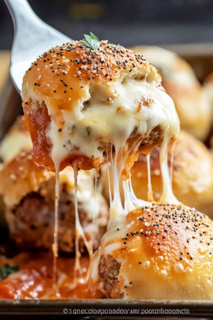 Italian sliders on soft buns, filled with meats, cheese, and herbs, a quick and delicious option for game day sliders.