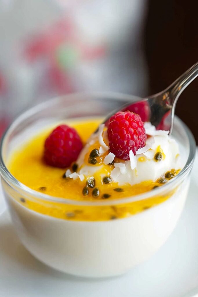 A creamy passionfruit and coconut panna cotta served in elegant glasses, a refreshing dessert for a romantic Valentines dinner.