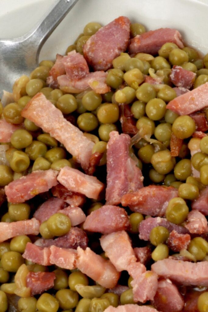 Tender green peas mixed with savory pancetta strips, a classic Italian Easter Side Dishes staple.