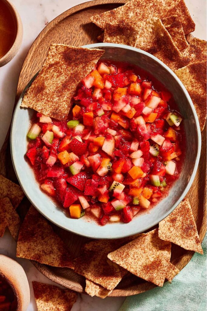 Fresh fruit salsa with cinnamon chips, perfect Cinco de Mayo snacks.