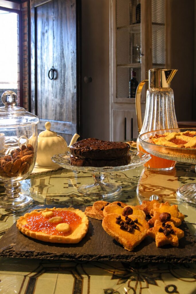 Dreamy Airbnbs in Tuscany at il burellino with homemade pastries, cake, almonds, and juice