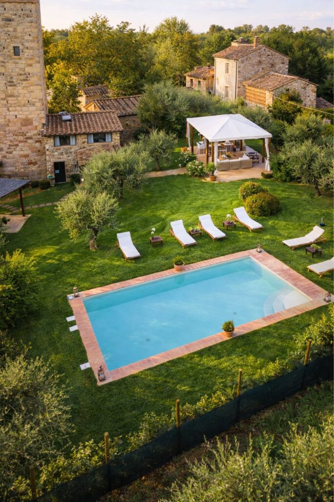 Villa Matilde Villas in Tuscany with Private Pool with stone farmhouse, garden, and Lucca hills views