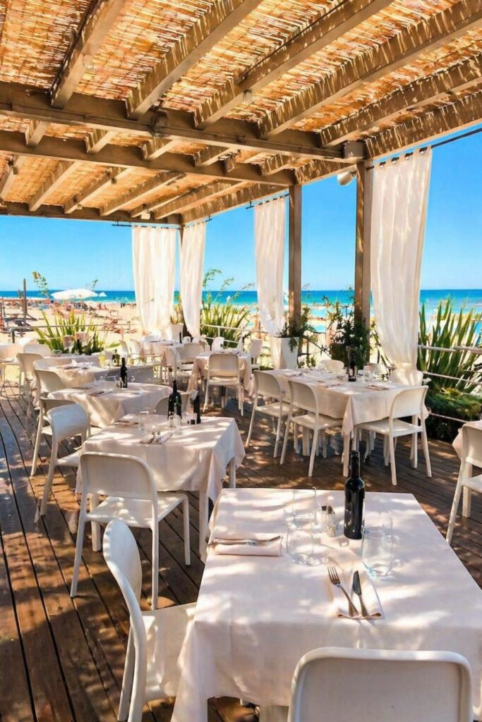 Tombolo Talasso Resort seafront terrace dining, a serene Beach Hotels in Tuscany scene on the Tuscan Coast