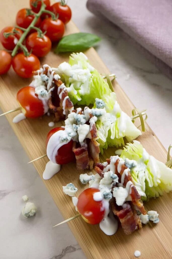 Iceberg wedge salad skewers with bacon and blue cheese, great things to make for fourth of july.