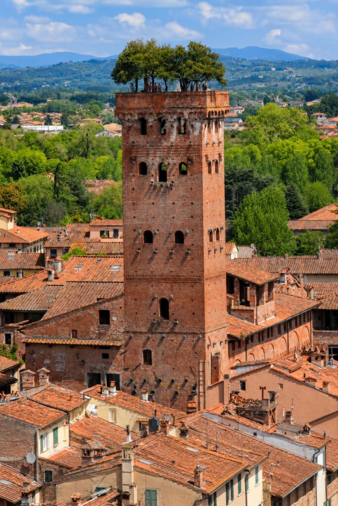 Lucca brick tower and terracotta rooftops for Where to stay in Tuscany near city walls